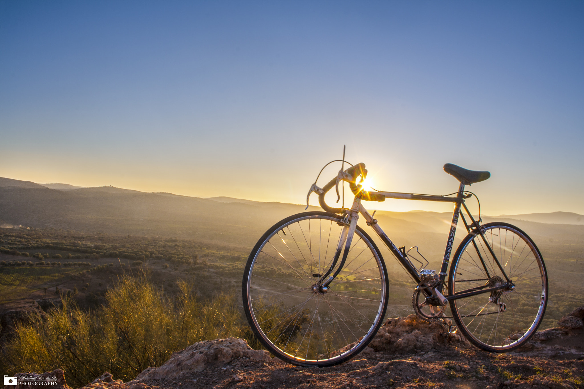 Canon EOS 1000D (EOS Digital Rebel XS / EOS Kiss F) sample photo. Biking into the sunset photography
