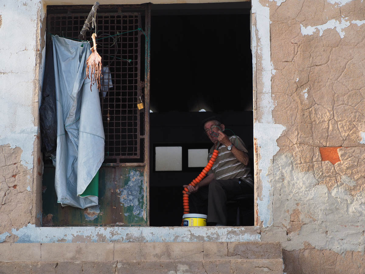 Olympus OM-D E-M1 sample photo. Fisherman at work photography