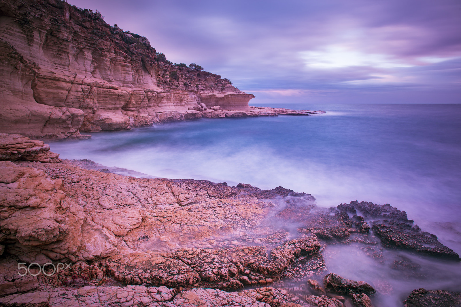 Nikon AF-S Nikkor 17-35mm F2.8D ED-IF sample photo. Red rocky beach photography