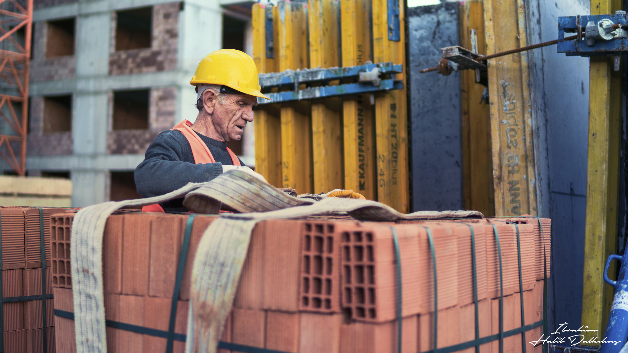 Sony a6300 + 30mm F1.4 DC DN | Contemporary 016 sample photo. Construction old man photography