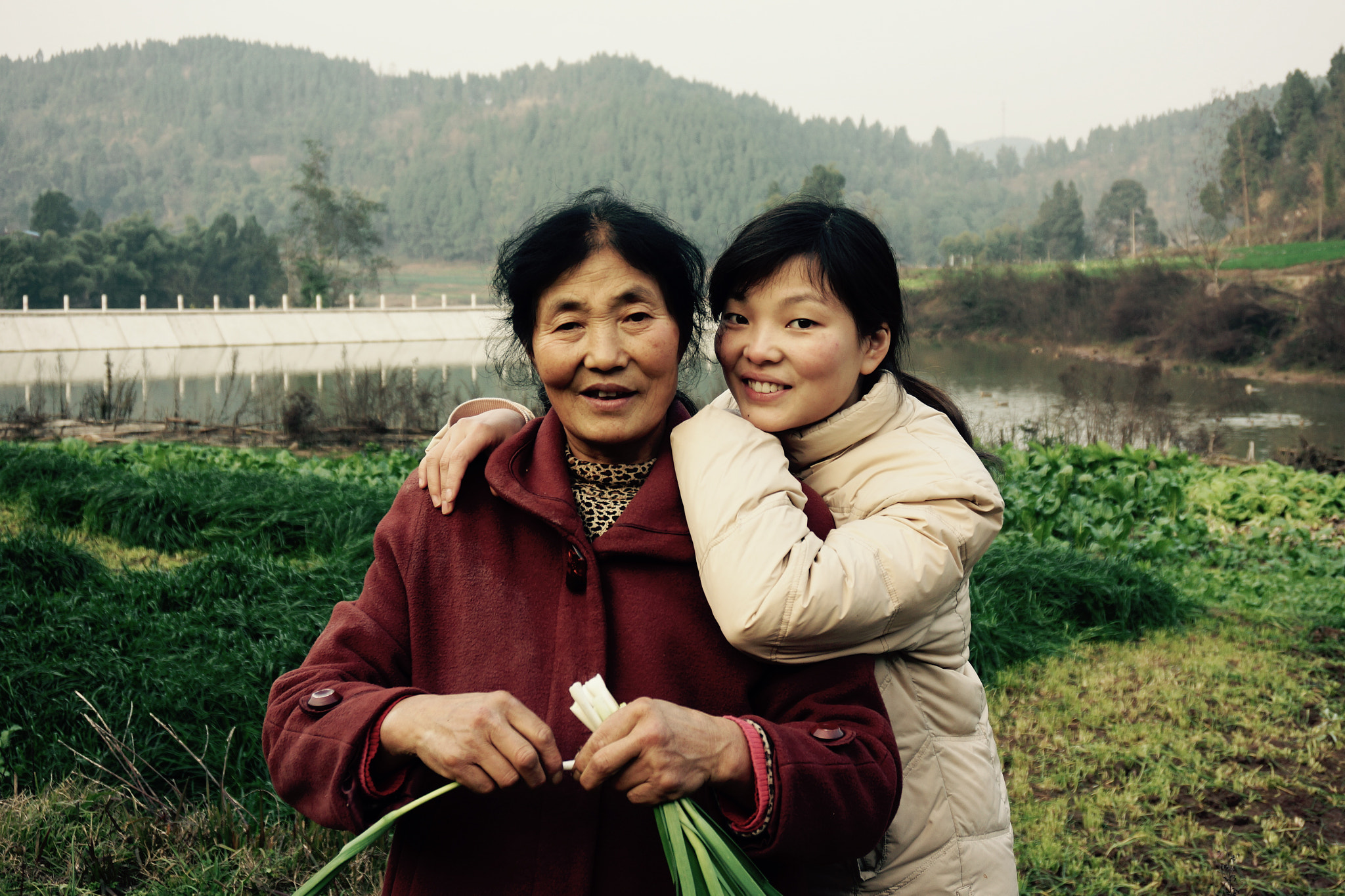 Sony Alpha NEX-7 + Sony E 18-50mm F4-5.6 sample photo. My girl and her mother photography