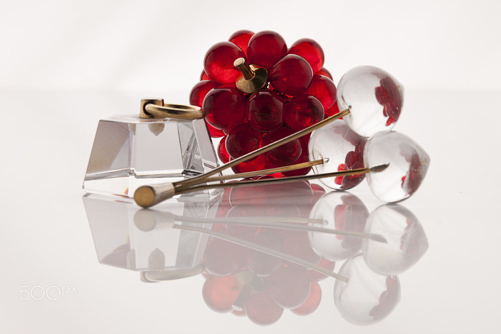 Tamron SP 24-70mm F2.8 Di VC USD sample photo. Glass objects on a white reflective surface photography