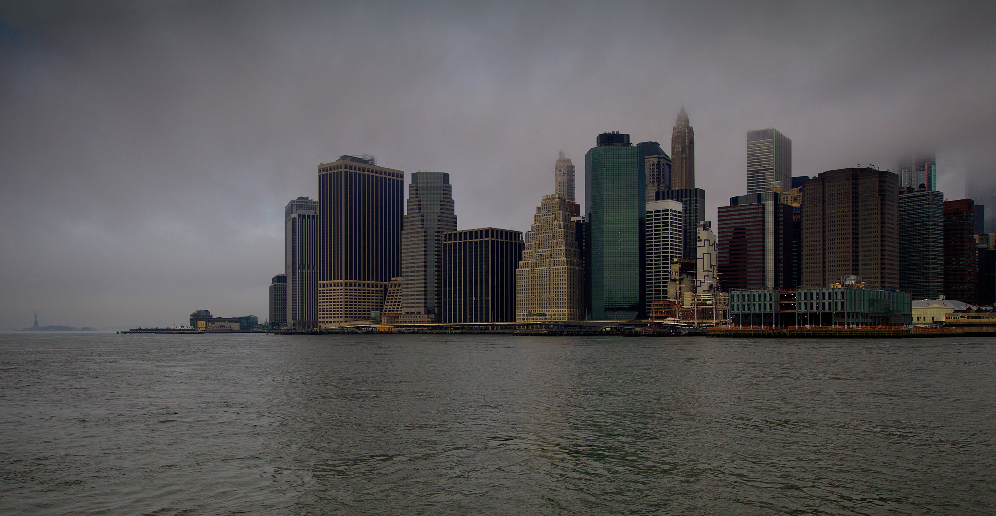 Sigma 10-20mm F3.5 EX DC HSM sample photo. Lower manhattan with statue of liberty photography