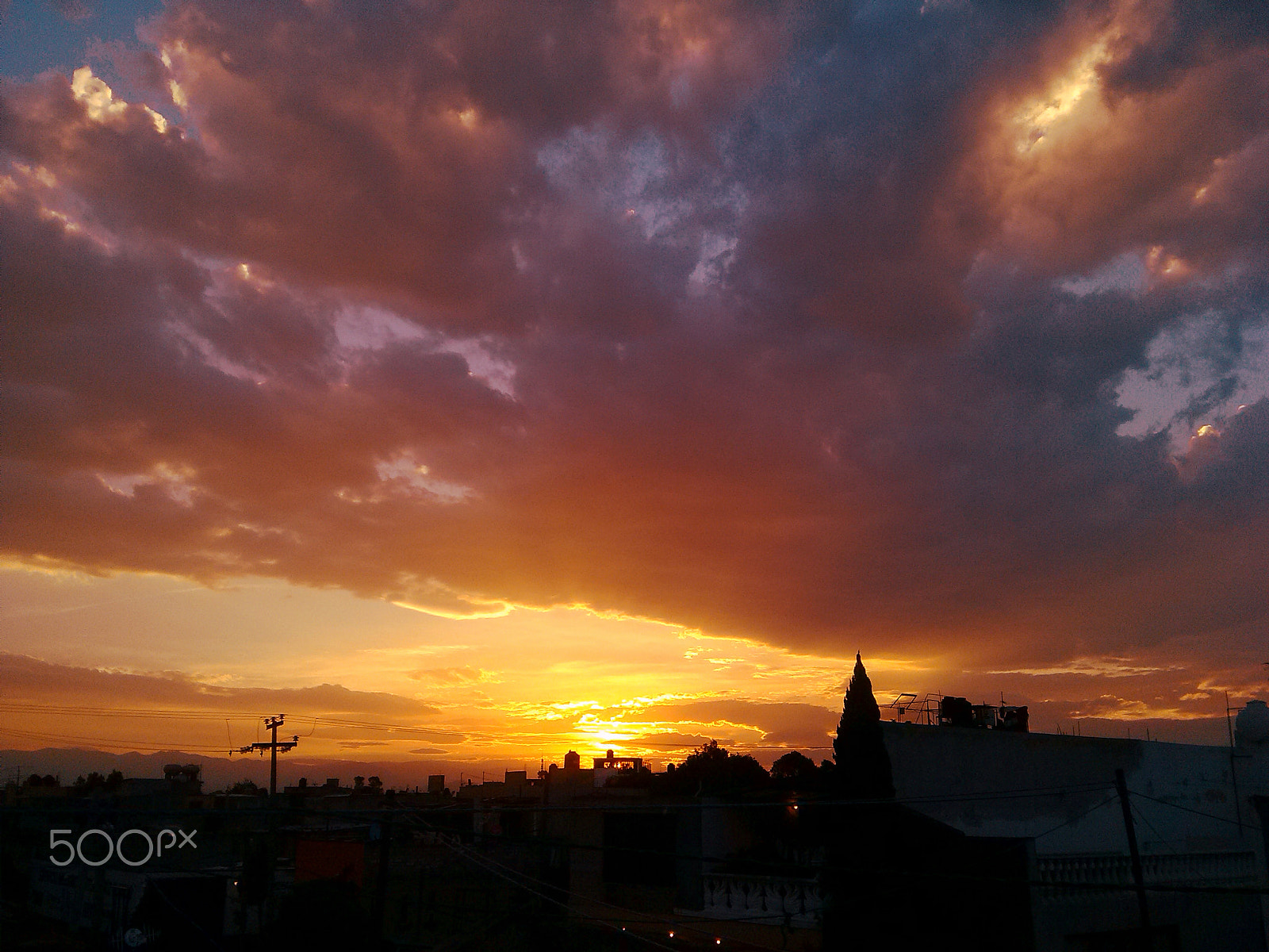 LG OPTIMUS L7 sample photo. Sunset with fire and blue photography