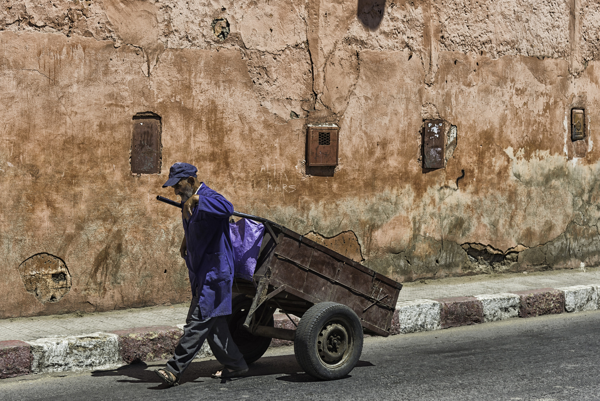 Moroccan Man Pulling Trolley