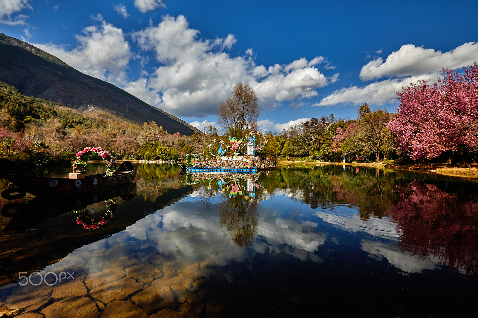 Canon EF 16-35mm F2.8L II USM sample photo. Clouds reflection by the butterfly spring photography
