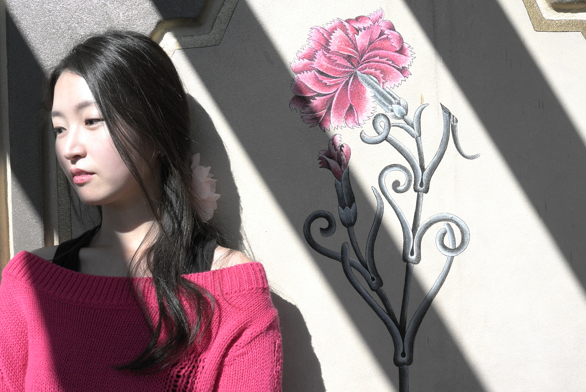 Leica X1 sample photo. A girl and the flower in the spring photography