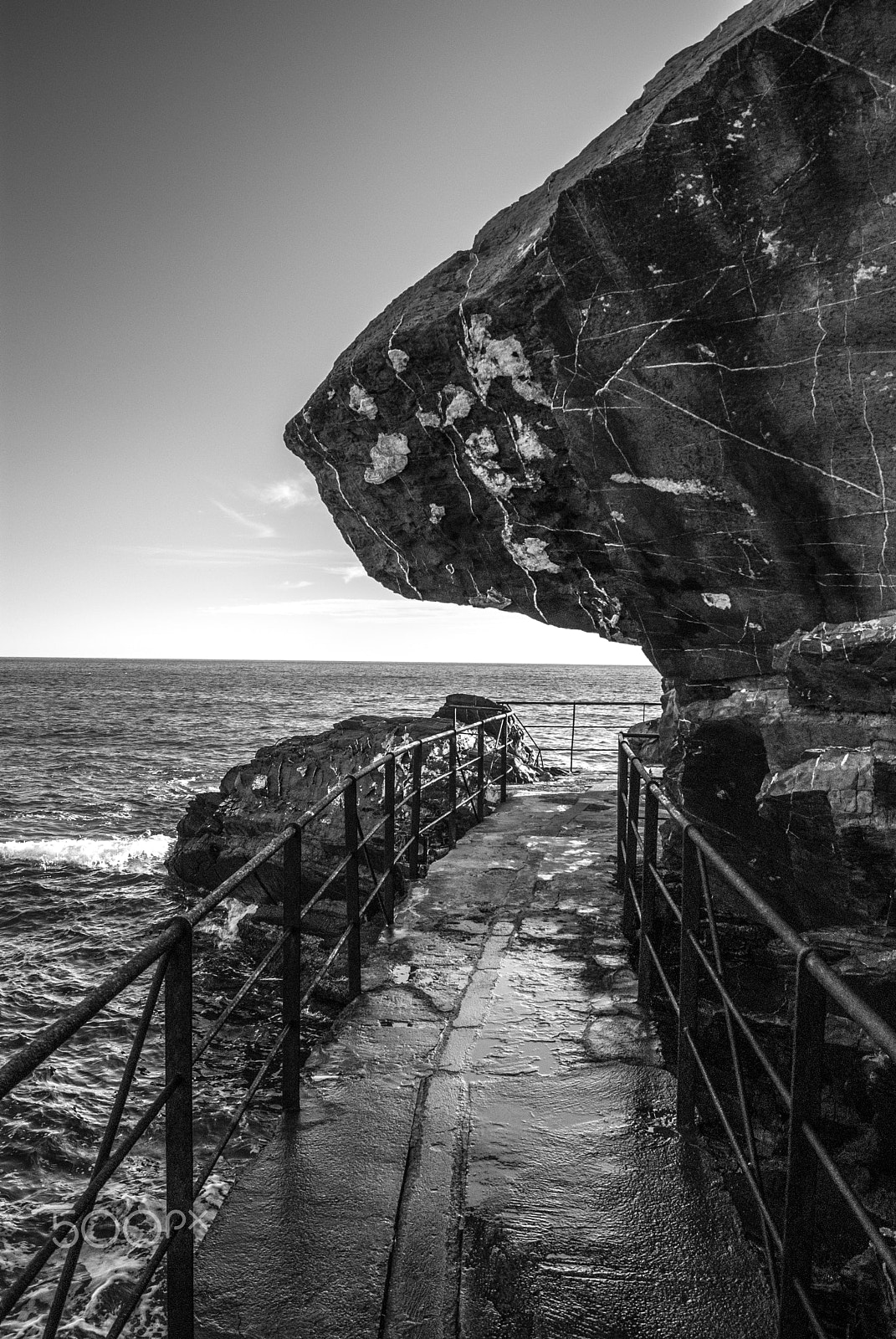 Sony Alpha DSLR-A230 sample photo. Walking on the sea in black photography