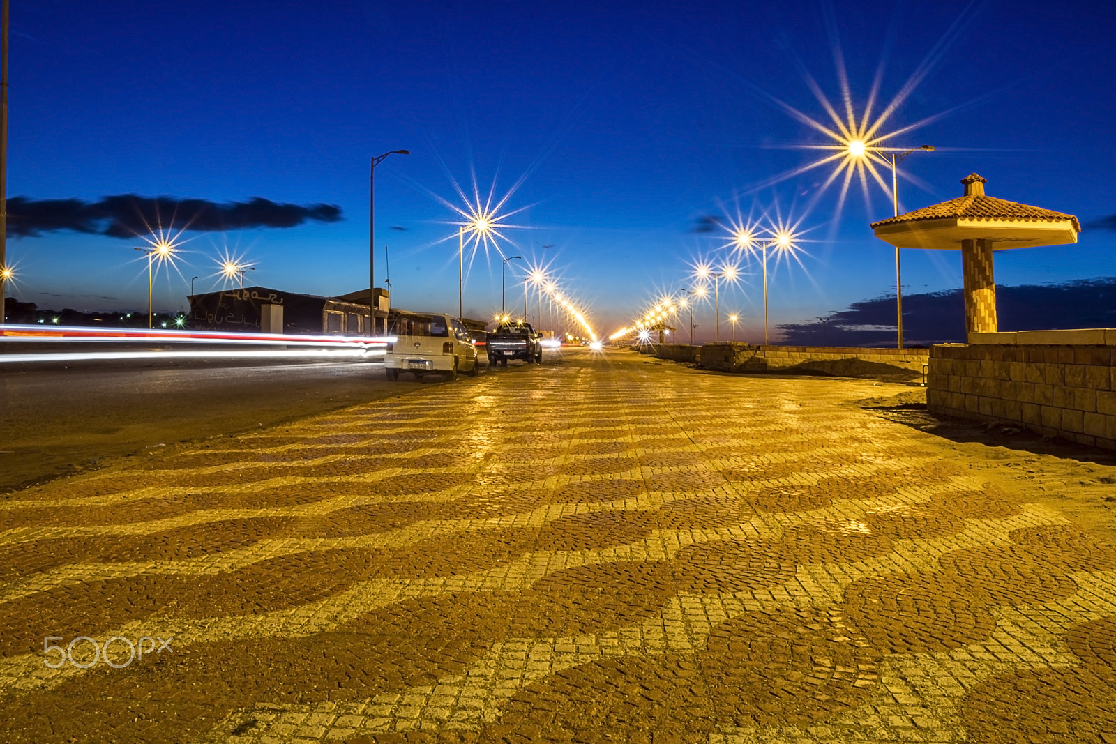 Nikon D7200 sample photo. Seaside street lights from underground photography