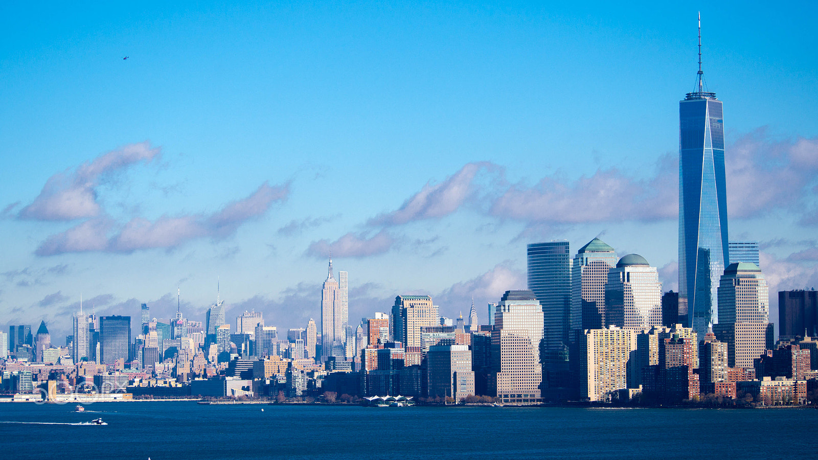 Olympus OM-D E-M5 sample photo. Skyline from lady liberty island photography