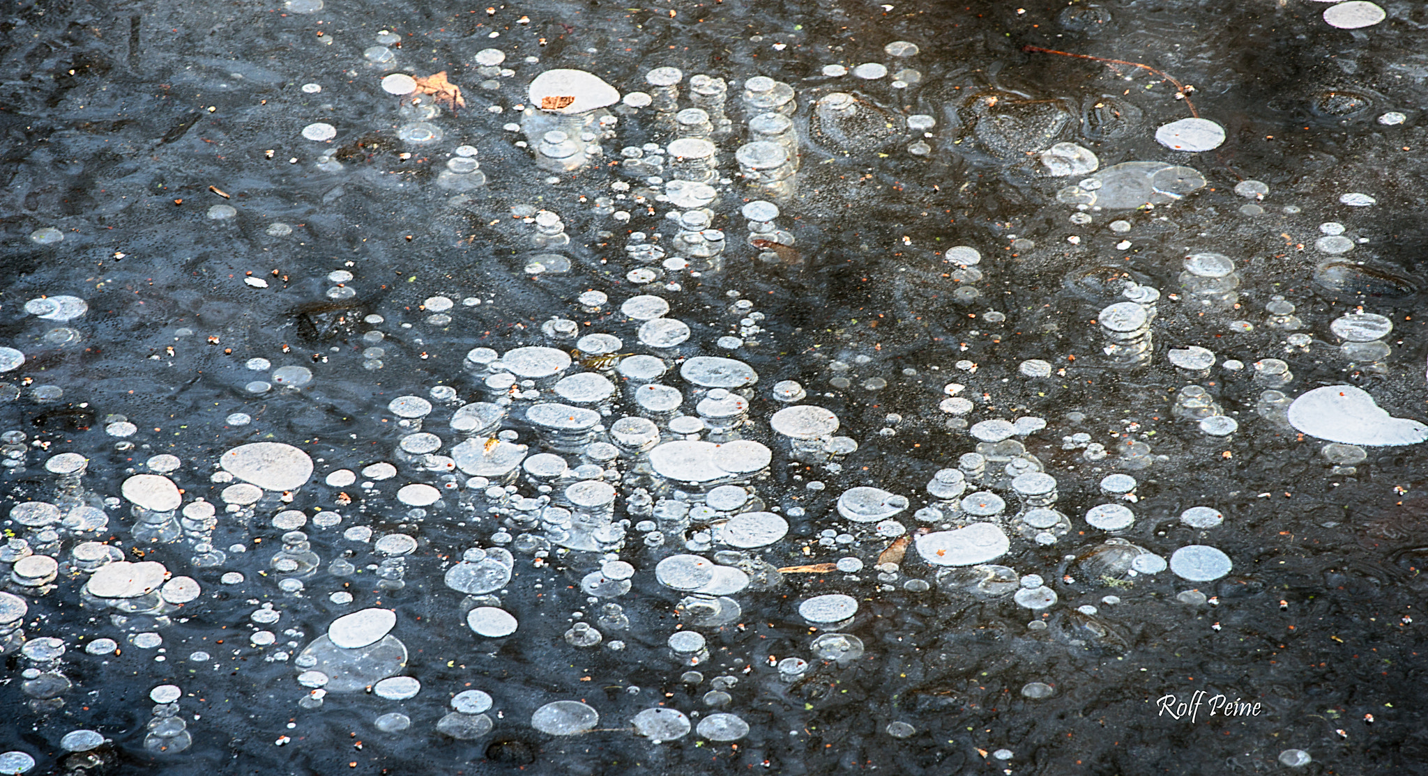 Nikon AF-S Nikkor 70-200mm F4G ED VR sample photo. Ice bubbles photography