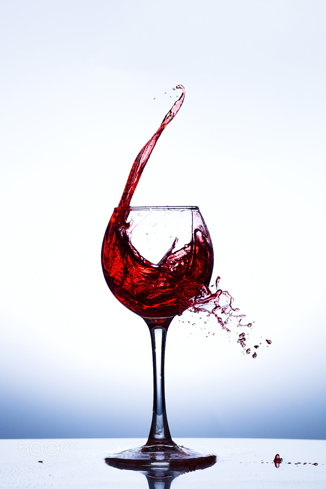 Canon EOS-1D Mark IV sample photo. Wine splashing in glass photography