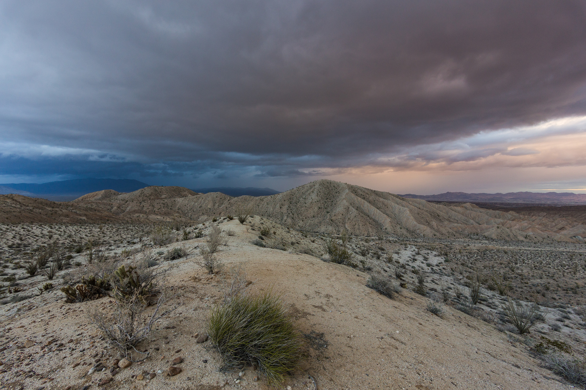 Canon EOS 6D + Canon EF-S 17-85mm F4-5.6 IS USM sample photo. Storm brewing. carrizo badlands overlook. photography