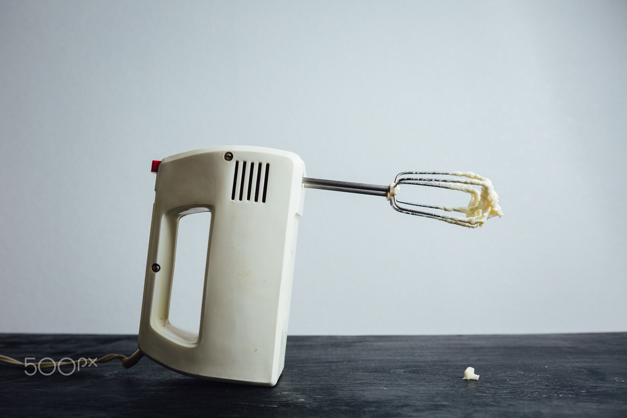 Mixing machine stained with cream
