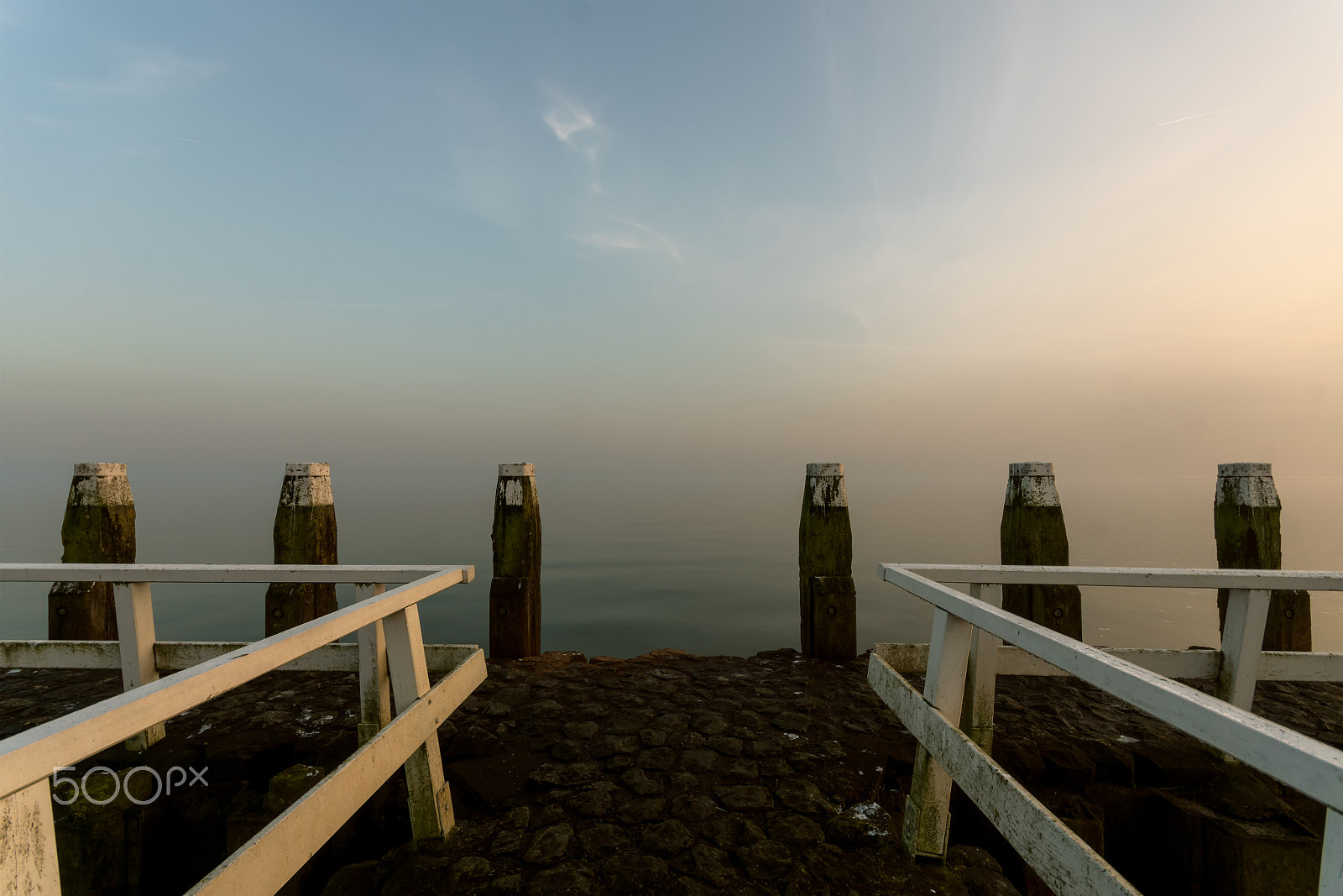 Sigma AF 10-20mm F4-5.6 EX DC sample photo. Scaffolding poles in the mist photography