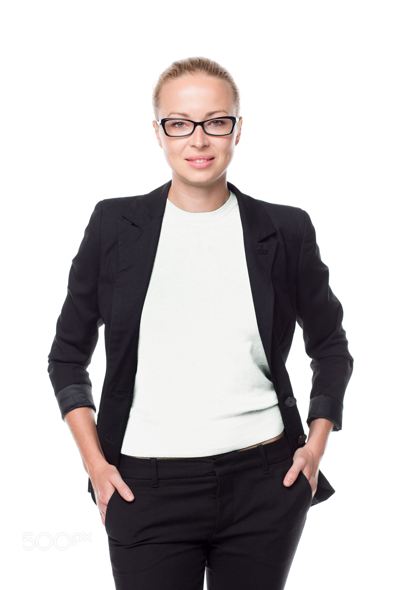 Business woman standing with arms crossed against white background..