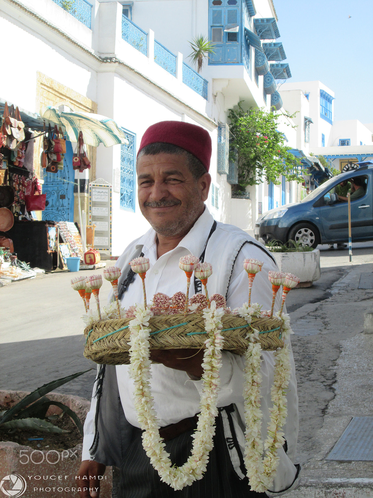 Canon PowerShot A2500 sample photo. Jasmine vendor in the town of sidi bou said photography