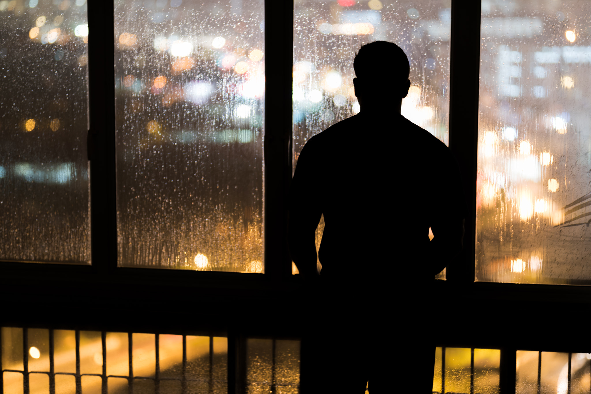 Nikon D810 + Sigma 105mm F2.8 EX DG Macro sample photo. Watching the city in the night rain photography