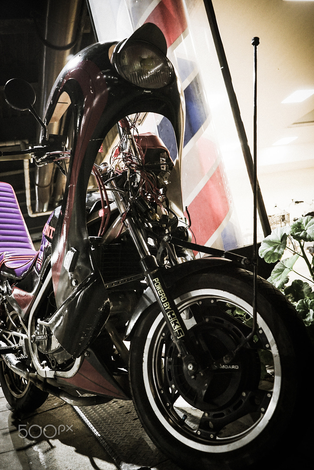 Sony E 20mm F2.8 sample photo. Motorcycle at barbar shop photography