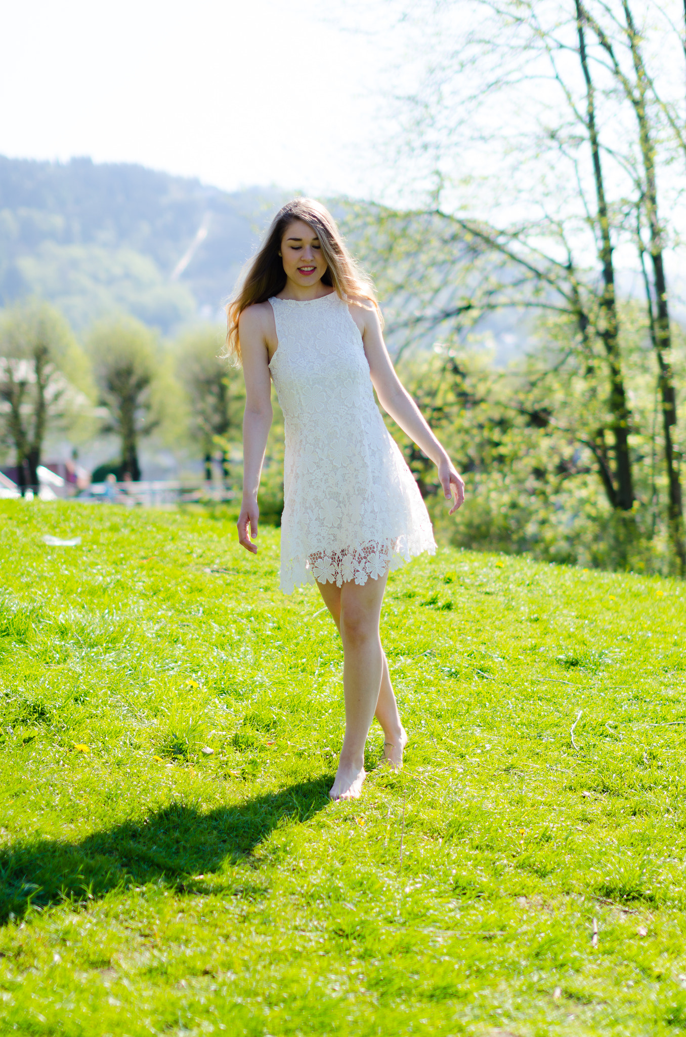 Nikon D7000 + Sigma 50mm F1.4 EX DG HSM sample photo. Beautiful girl in white dress in the park photography