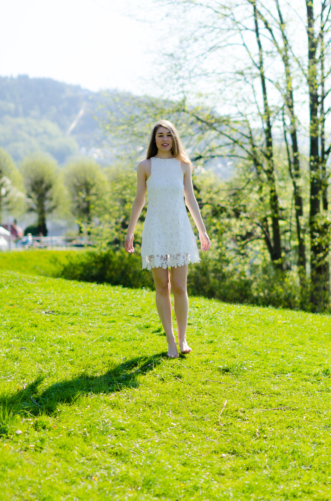 Nikon D7000 + Sigma 50mm F1.4 EX DG HSM sample photo. Beautiful girl in white dress in the park photography