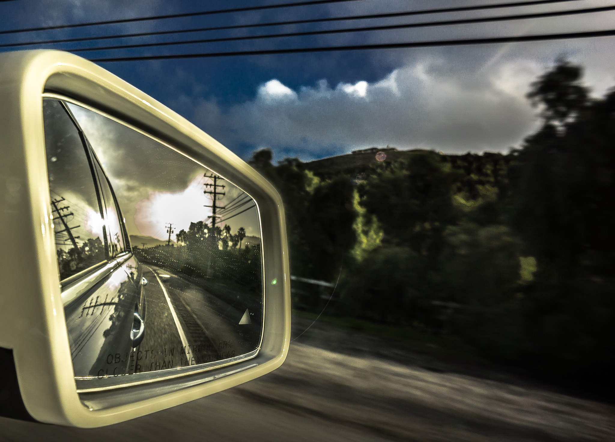 Sony Alpha NEX-7 + Sony E 16mm F2.8 sample photo. ☔️ the sun is in the rear view for a few more days ... photography