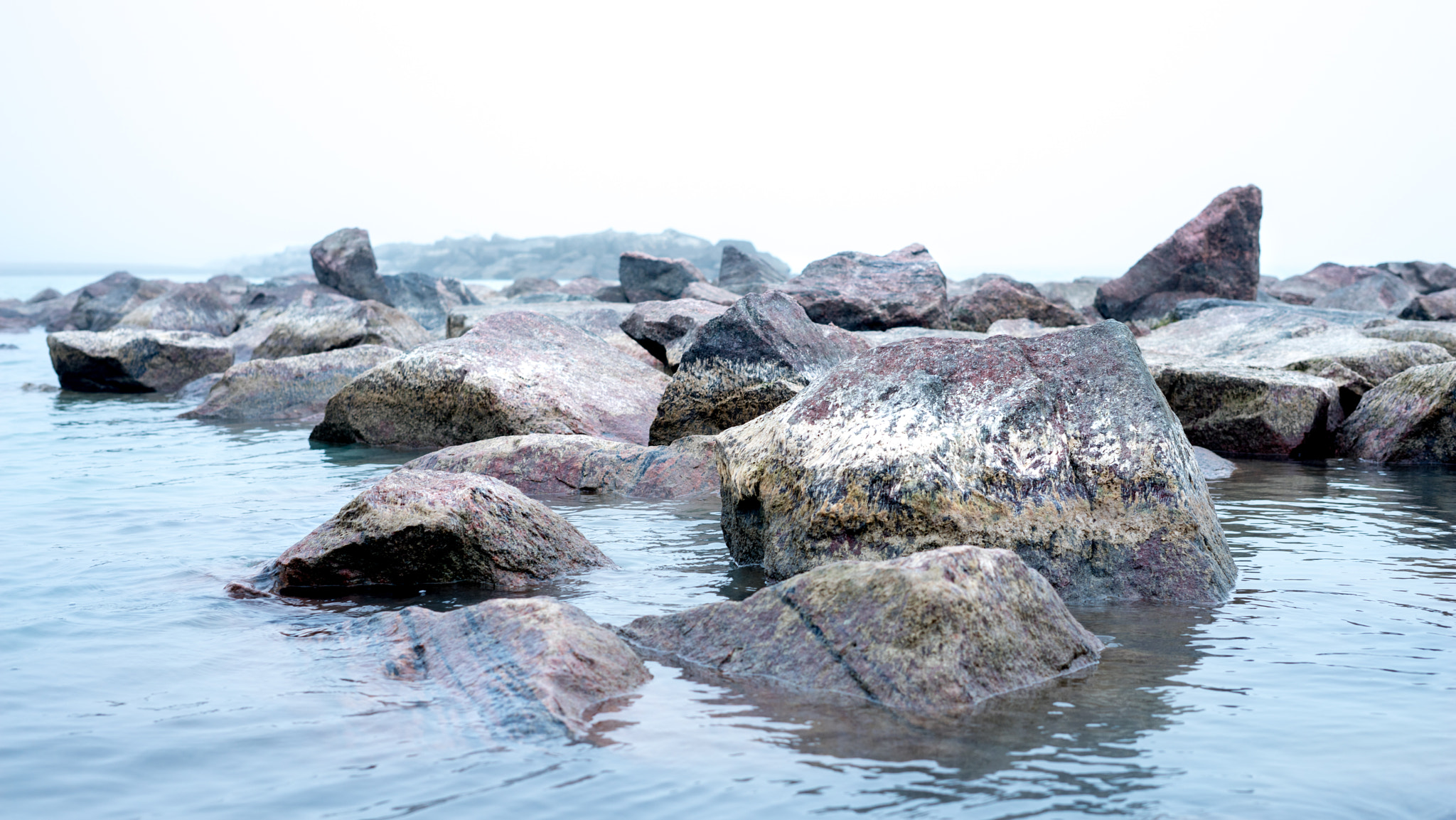 Sony a7R + Sony FE 50mm F1.8 sample photo. Face in the rocks photography