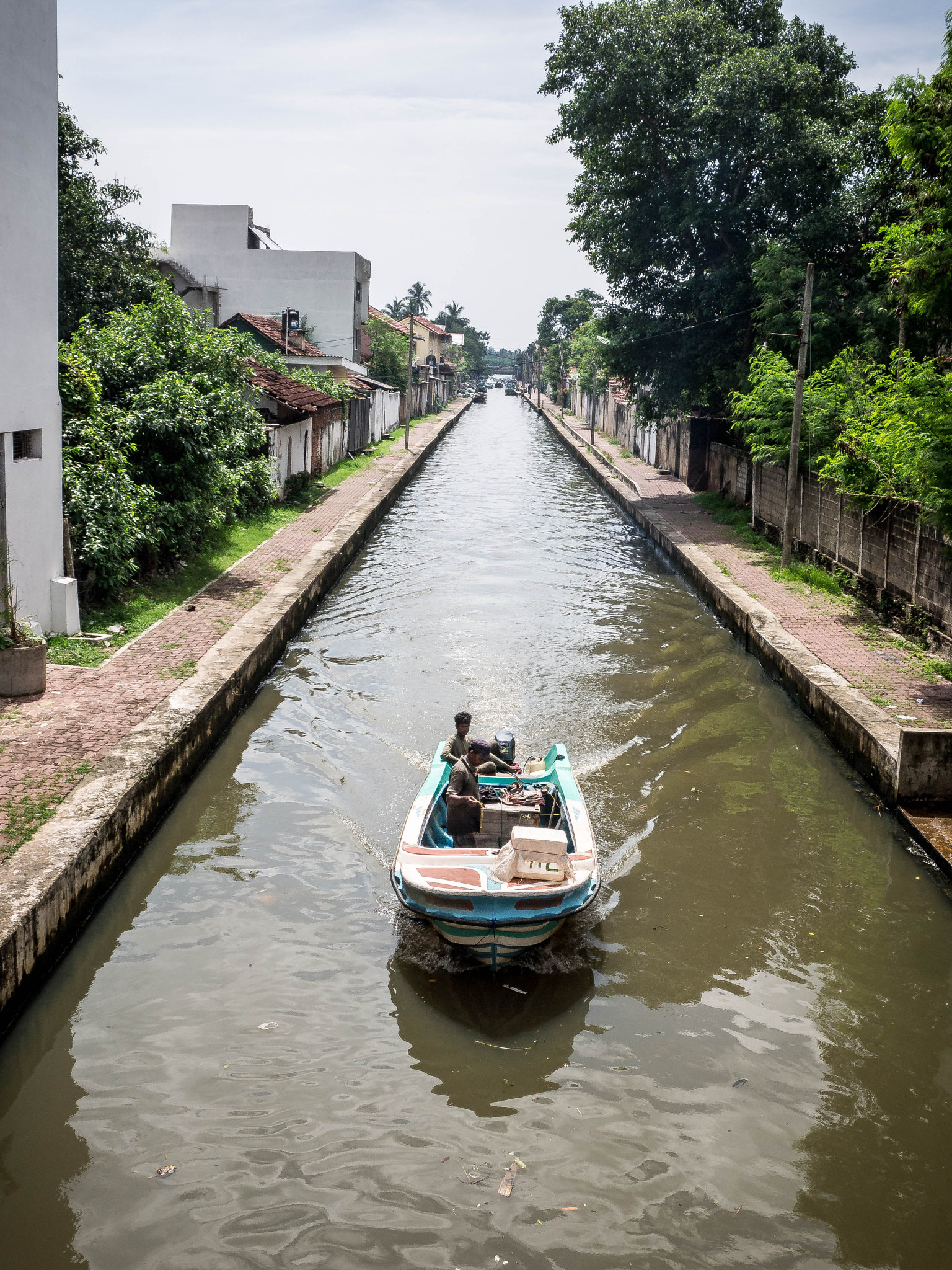 Panasonic Lumix DMC-GF3 + LUMIX G VARIO PZ 14-42/F3.5-5.6 sample photo. Boat on the canal photography