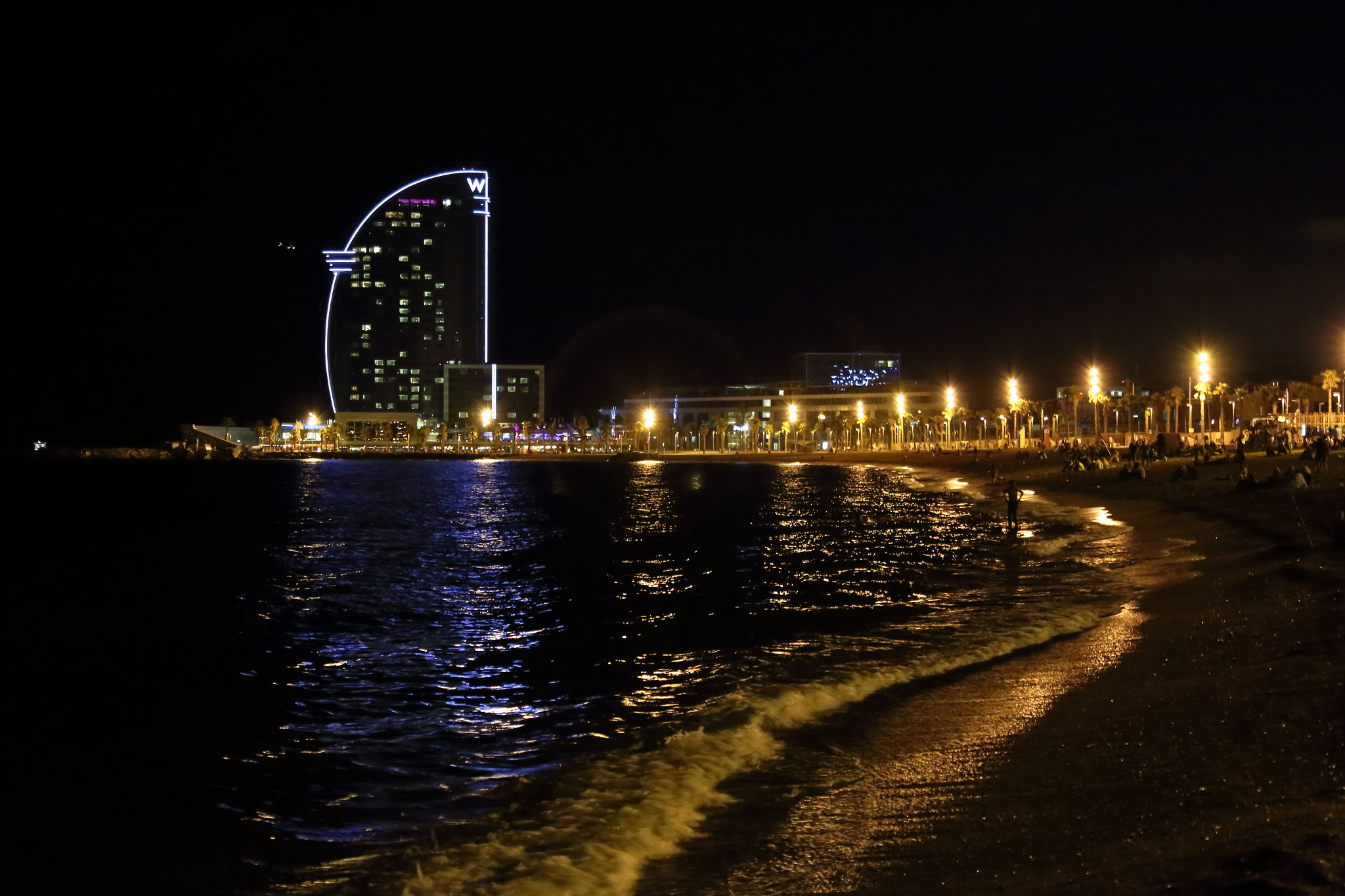 Canon EF 28-300mm F3.5-5.6L IS USM sample photo. Night view hotel w barcelona from the beach of bar photography