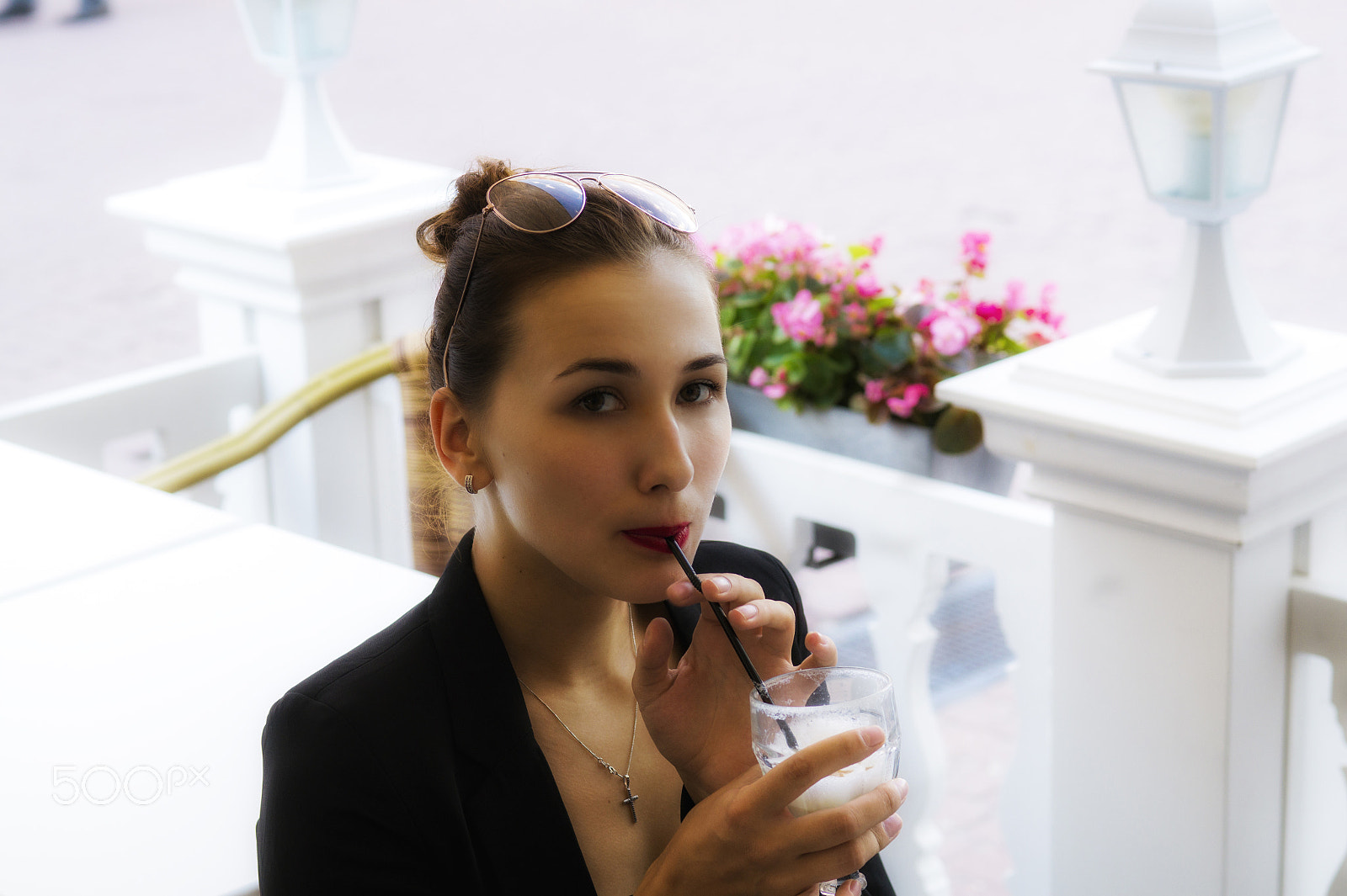 Sony SLT-A58 + Sony 50mm F1.4 sample photo. Beautiful girl in business suit drinkers drink in summer cafe photography