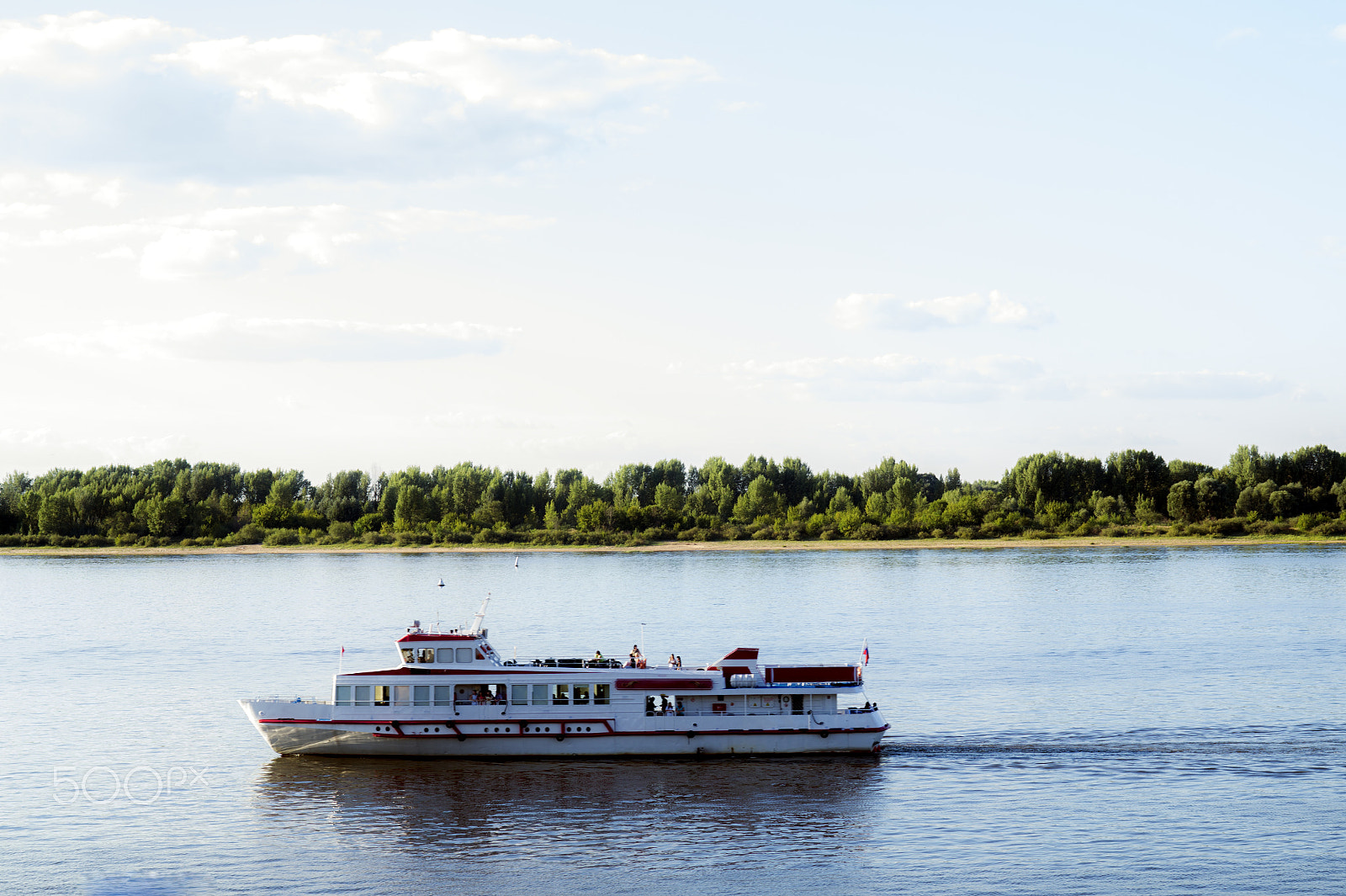 Sony SLT-A58 sample photo. Boat floats on the river photography