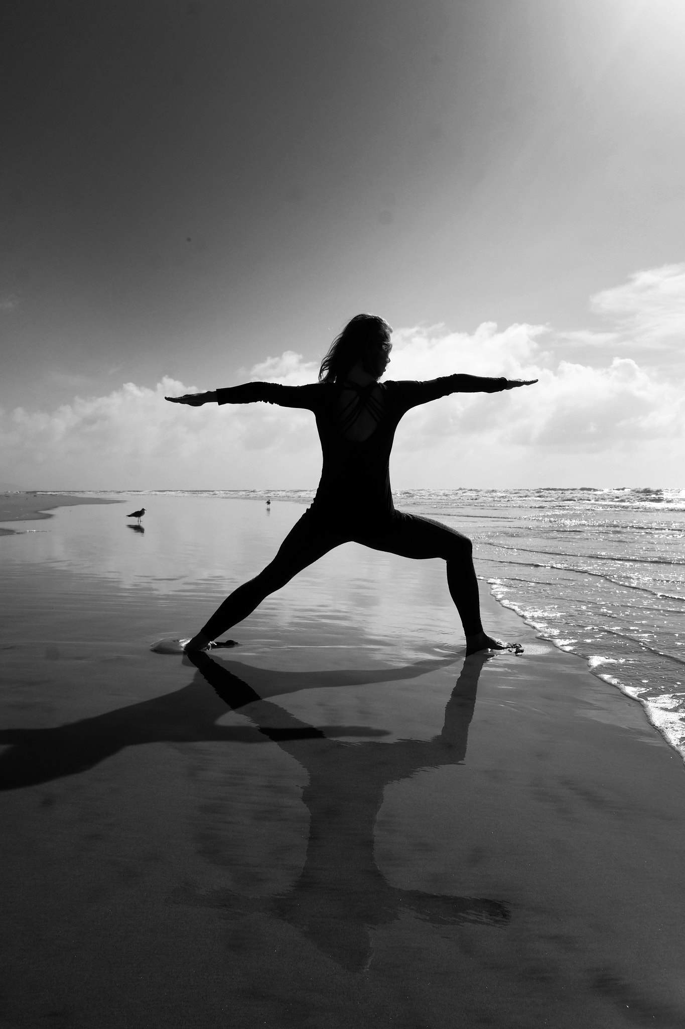 Fujifilm X-T1 + Fujifilm XF 18mm F2 R sample photo. Yoga on beach in california after storm photography