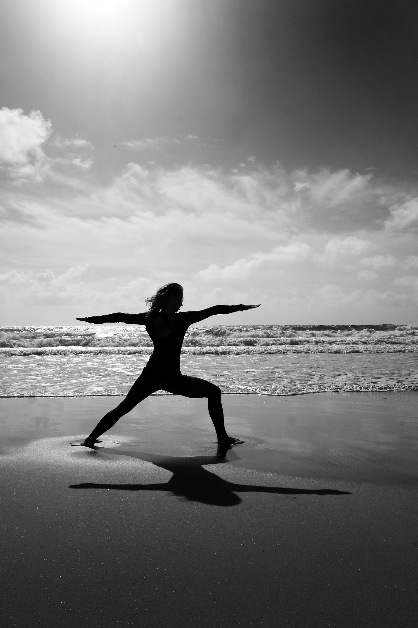 Fujifilm X-T1 + Fujifilm XF 18mm F2 R sample photo. Yoga on beach in california after storm photography
