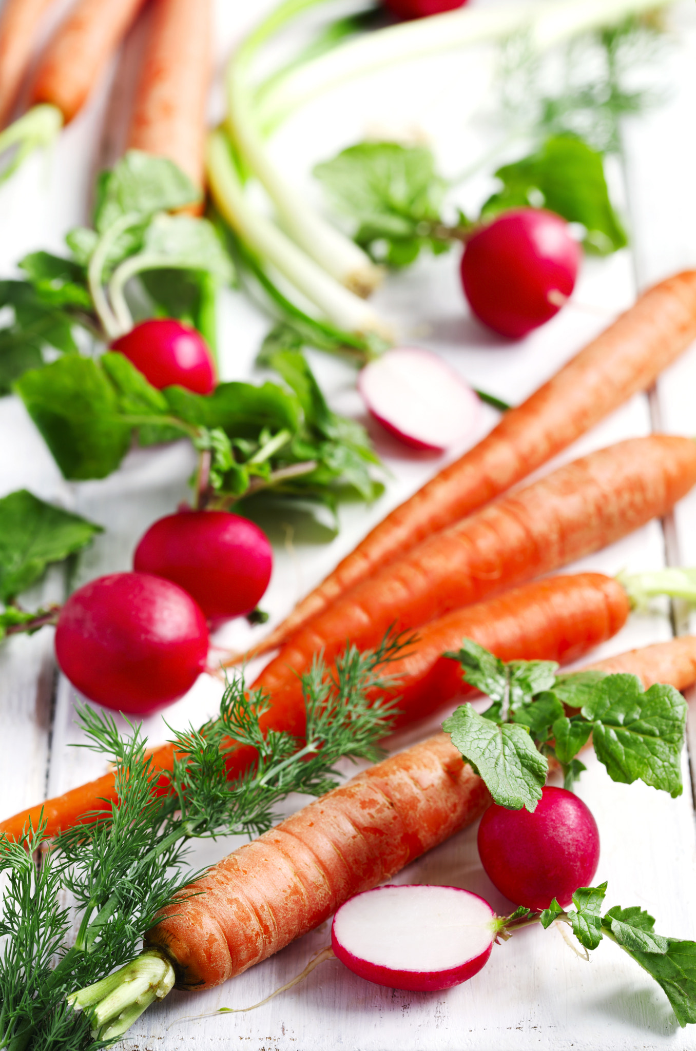 Canon EF 100mm F2.8 Macro USM sample photo. Spring vegetables on white wooden background. carrots, radish, g photography
