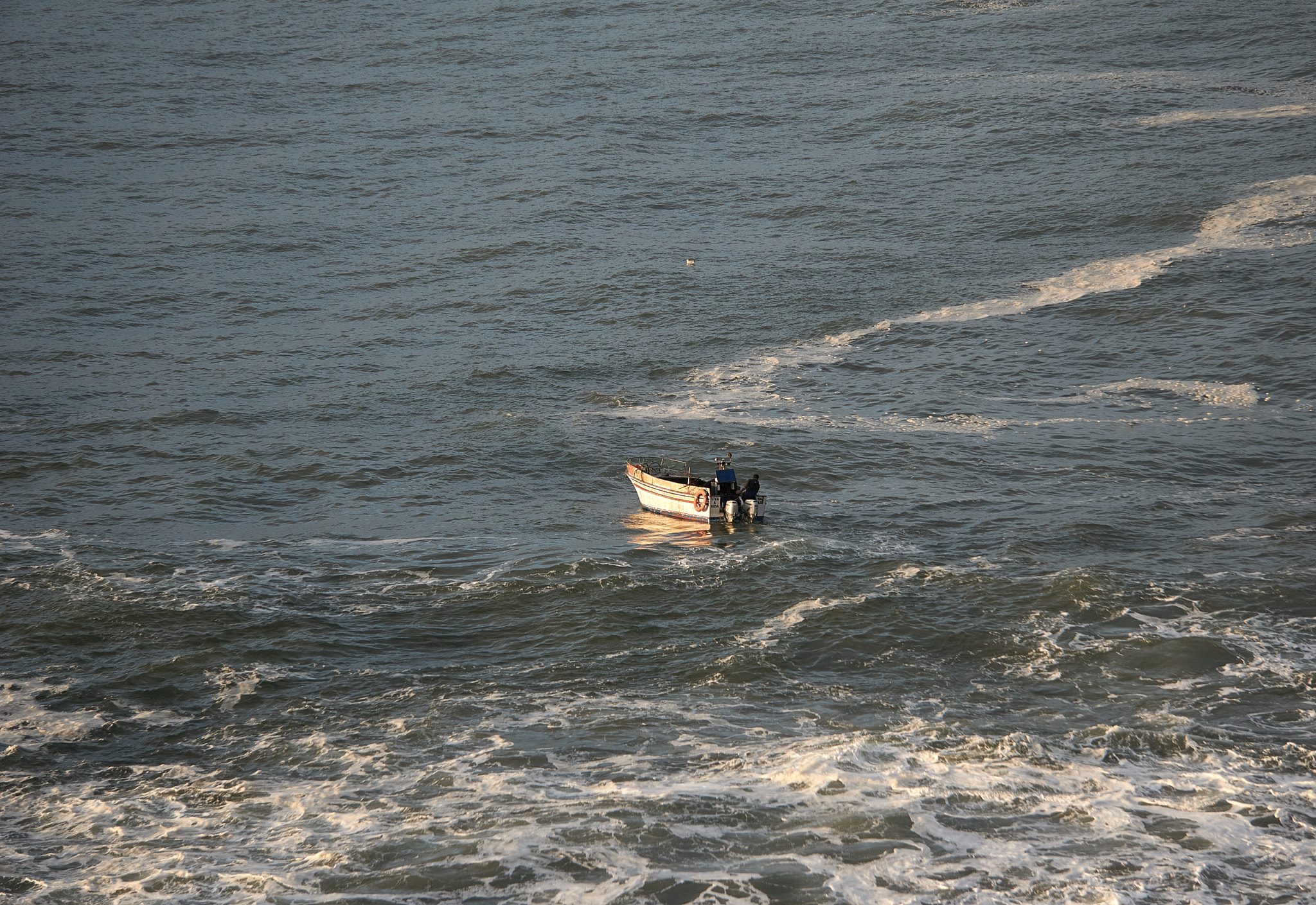 Sony E 55-210mm F4.5-6.3 OSS sample photo. Fisherman photography