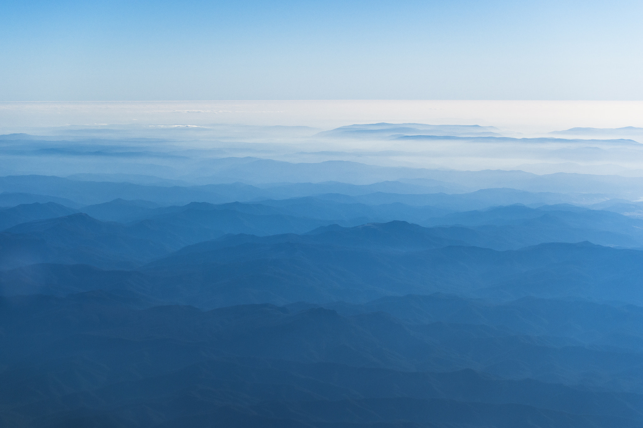 Olympus OM-D E-M5 + Panasonic Lumix G Vario 45-200mm F4-5.6 OIS sample photo. The blue mountains @flighlevel300 photography