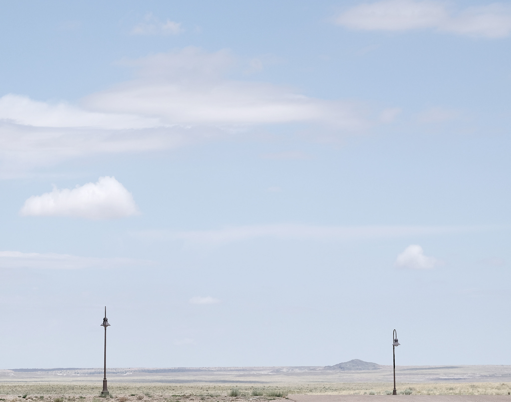 Fujifilm X-T1 + Fujifilm XF 90mm F2 R LM WR sample photo. Two light poles to nowhere photography