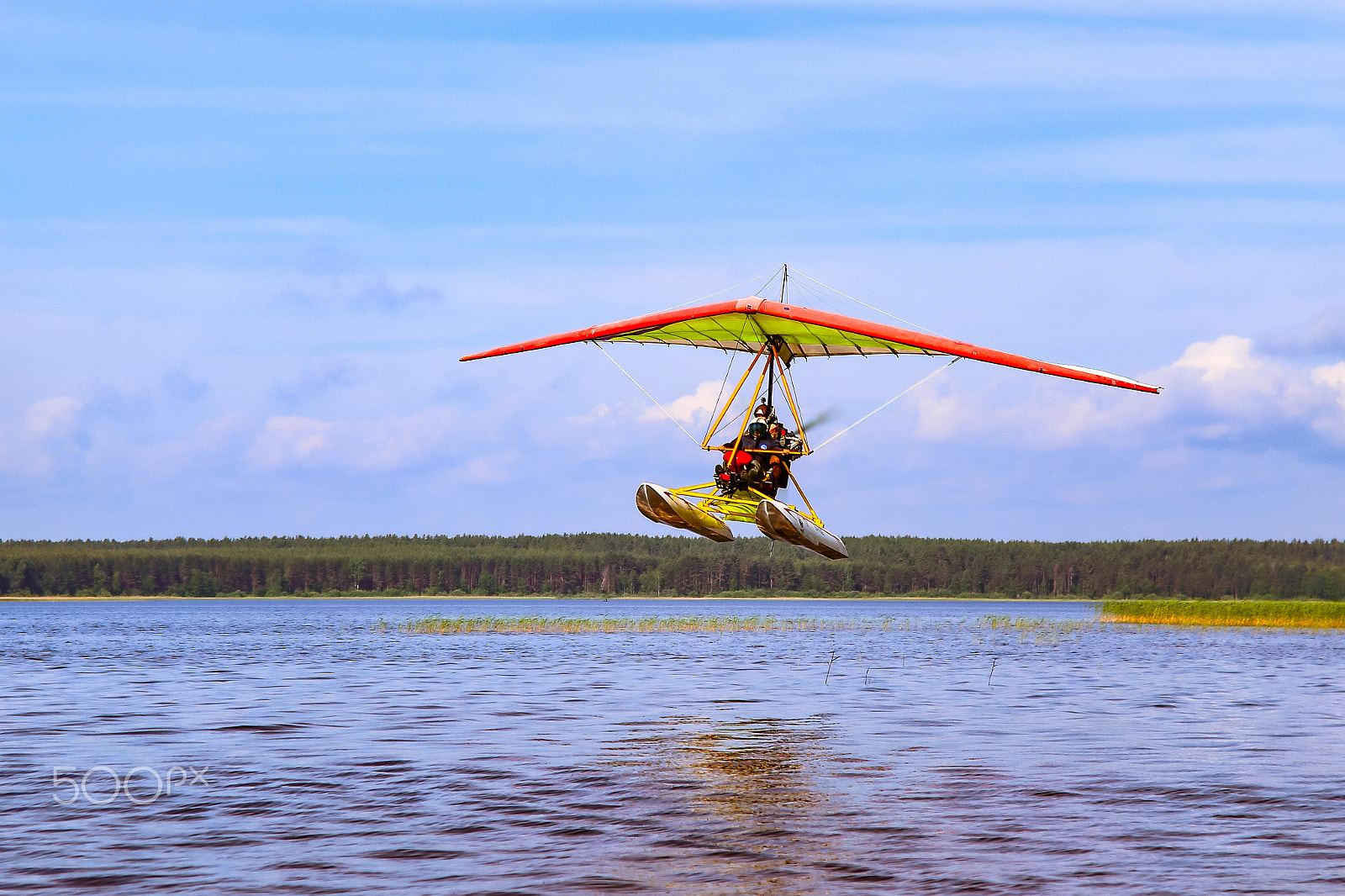 Canon EOS 6D + Canon EF 28-80mm f/2.8-4L sample photo. Motorized deltaplanes _ landing on water photography