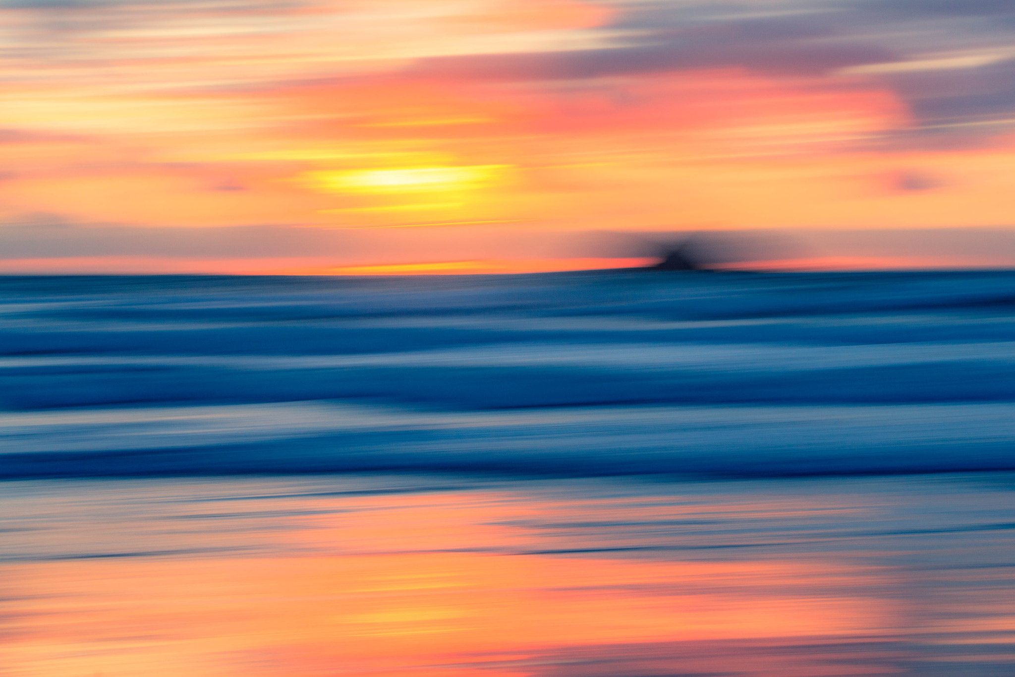 Canon EF-S 55-250mm F4-5.6 IS sample photo. Sunset blur photography