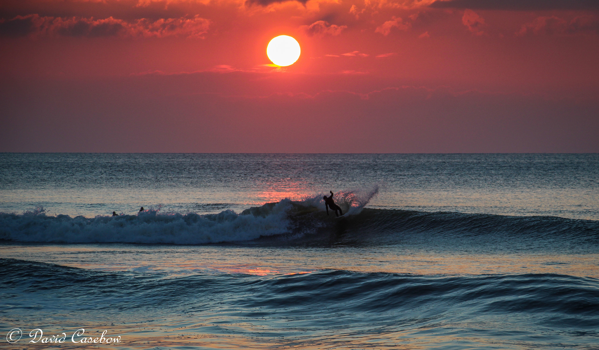 Canon EOS 100D (EOS Rebel SL1 / EOS Kiss X7) + Canon TS-E 90mm F2.8 Tilt-Shift sample photo. Surfing into the sunset photography