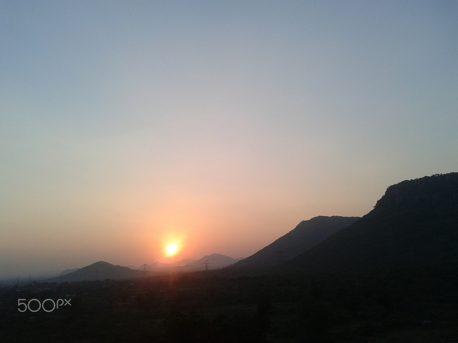 Samsung Galaxy Ace Duos sample photo. Sun set between mountain range photography