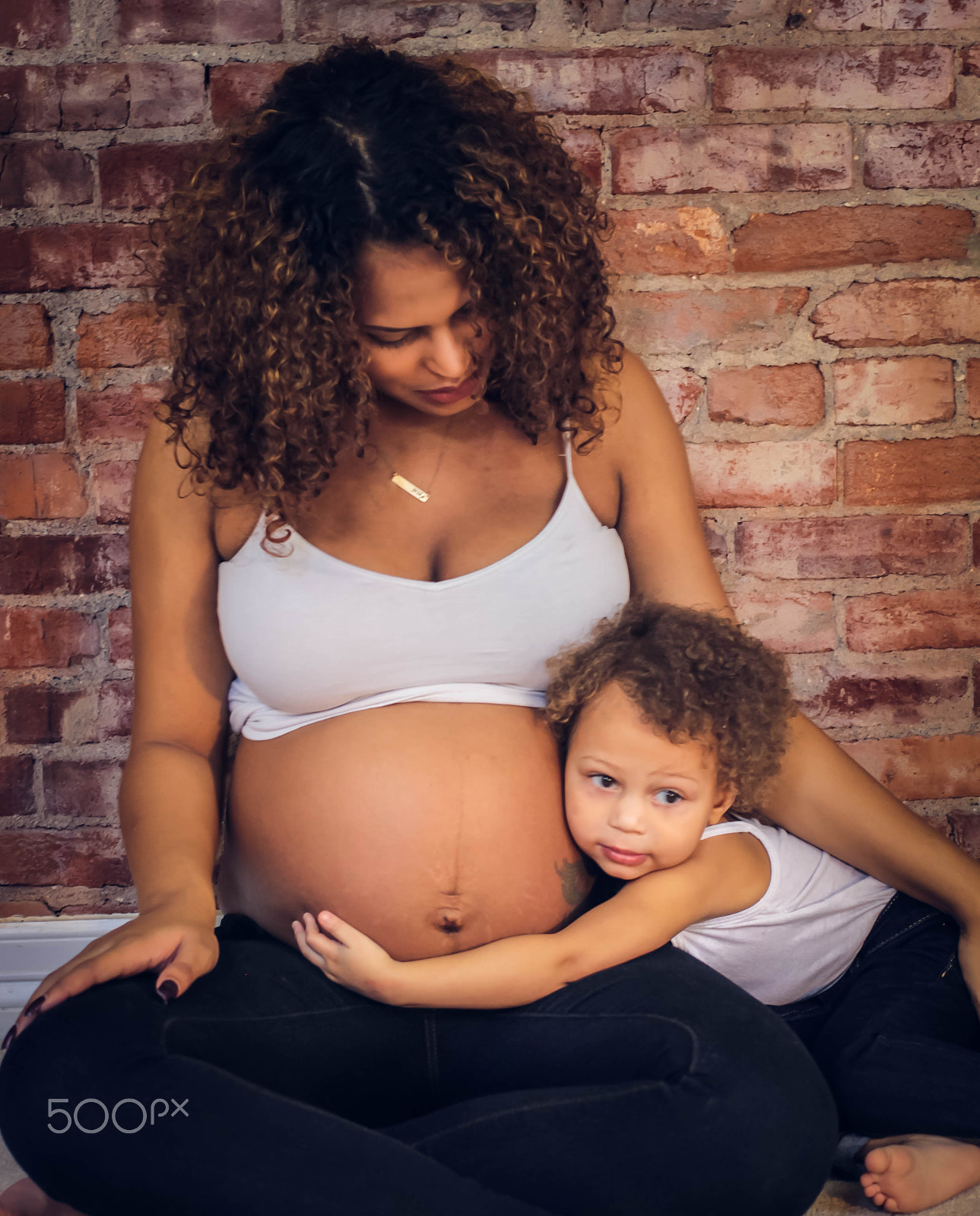 Canon EF 40mm F2.8 STM sample photo. A mothers love photography