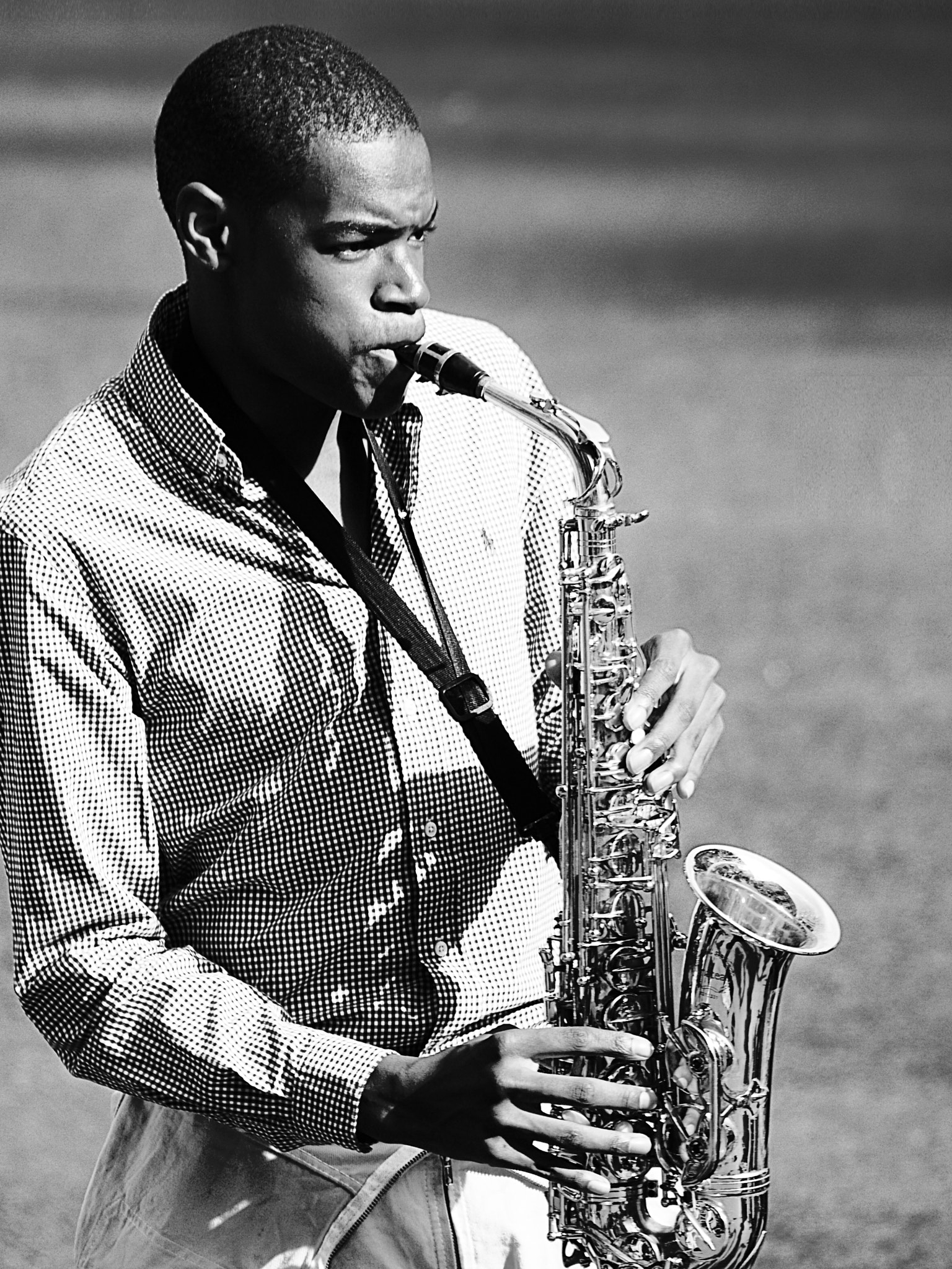 Leica Digilux 3 sample photo. Man and sax photography
