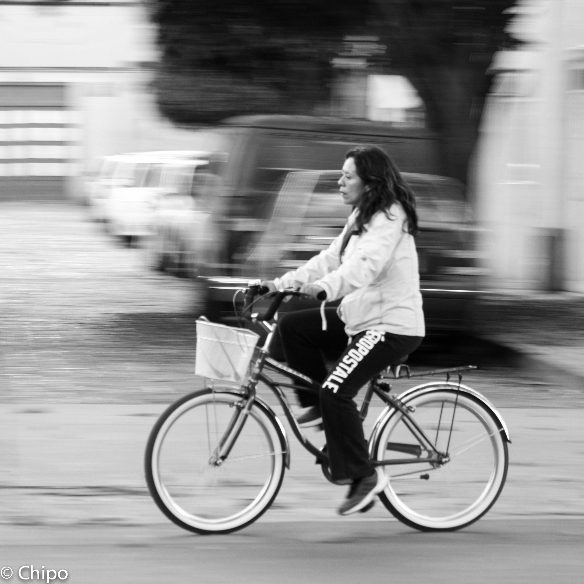 Canon EOS 400D (EOS Digital Rebel XTi / EOS Kiss Digital X) + EF75-300mm f/4-5.6 sample photo. Riding her bike photography