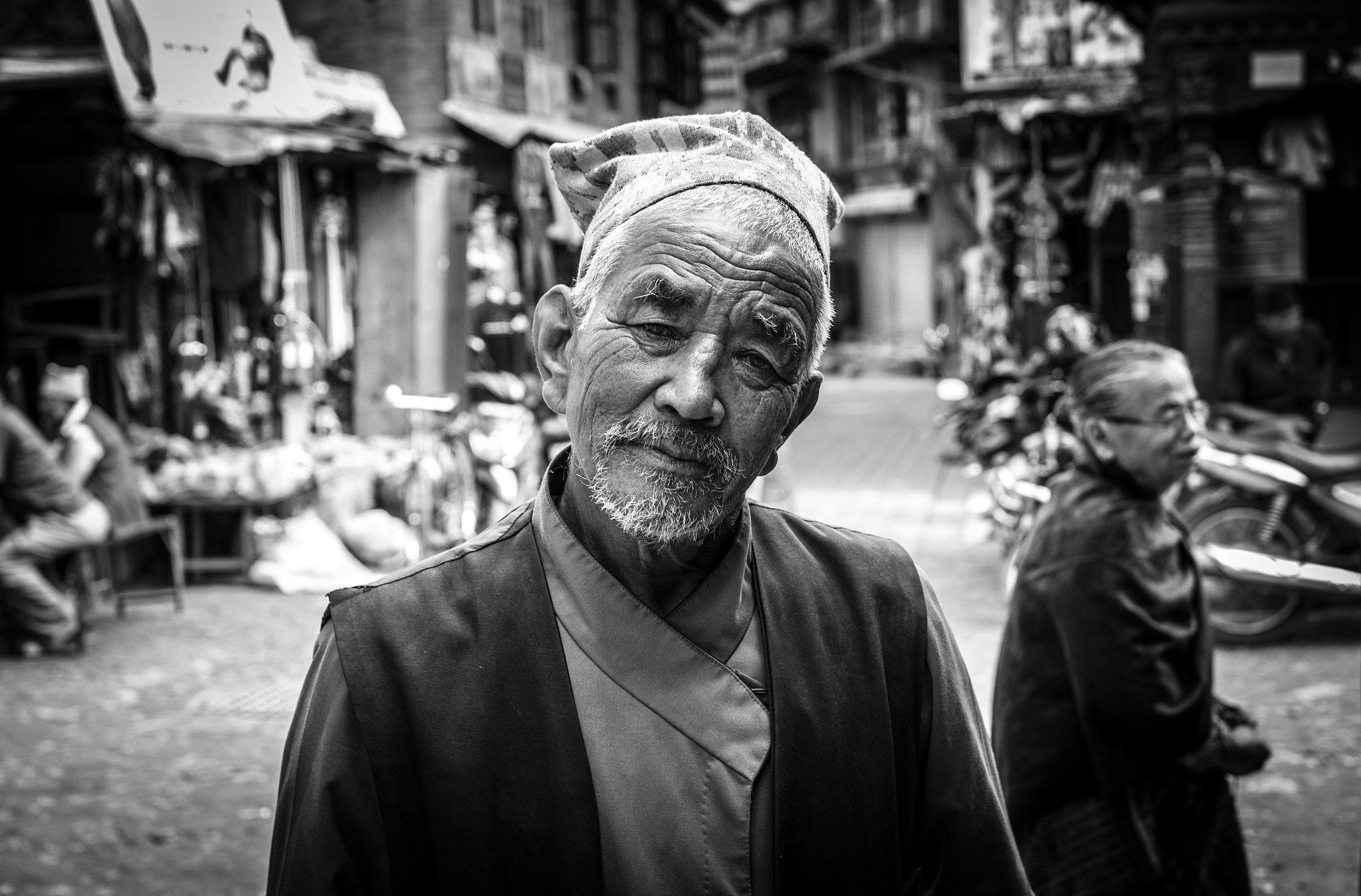 Canon EOS 80D + Canon EF 35mm F2 IS USM sample photo. Faces from nepal photography