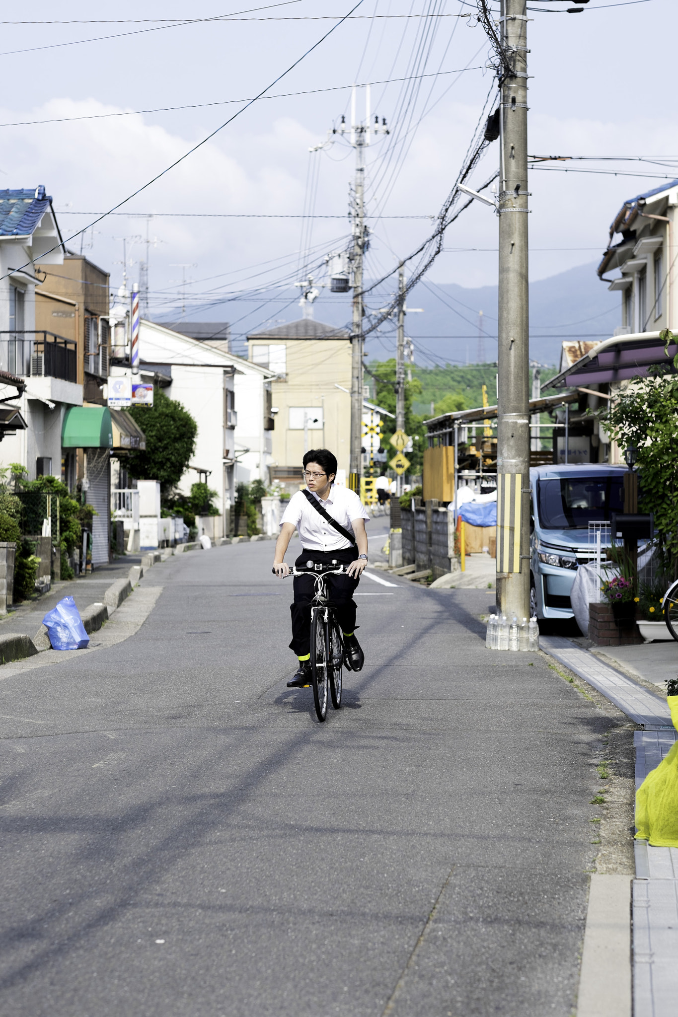 Fujifilm XF 56mm F1.2 R sample photo. Boy on a bicycle photography