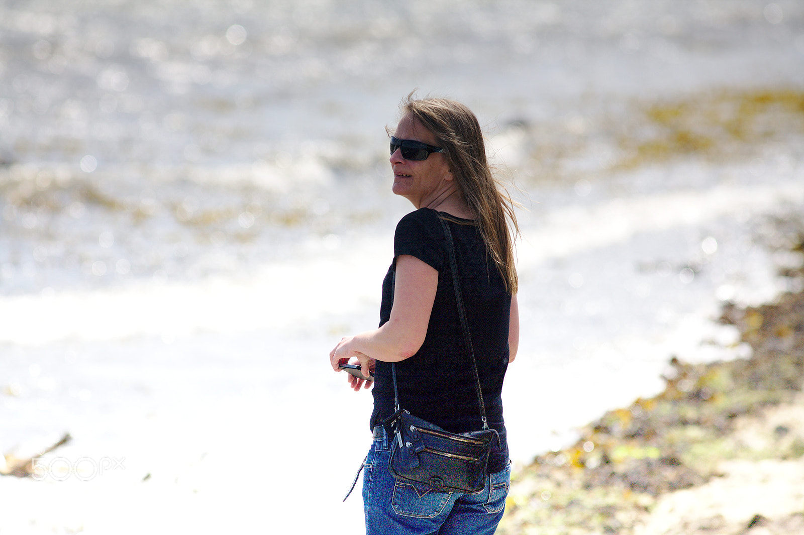 Canon EOS 5D + Canon EF 300mm F4L IS USM sample photo. Woman in the sun photography