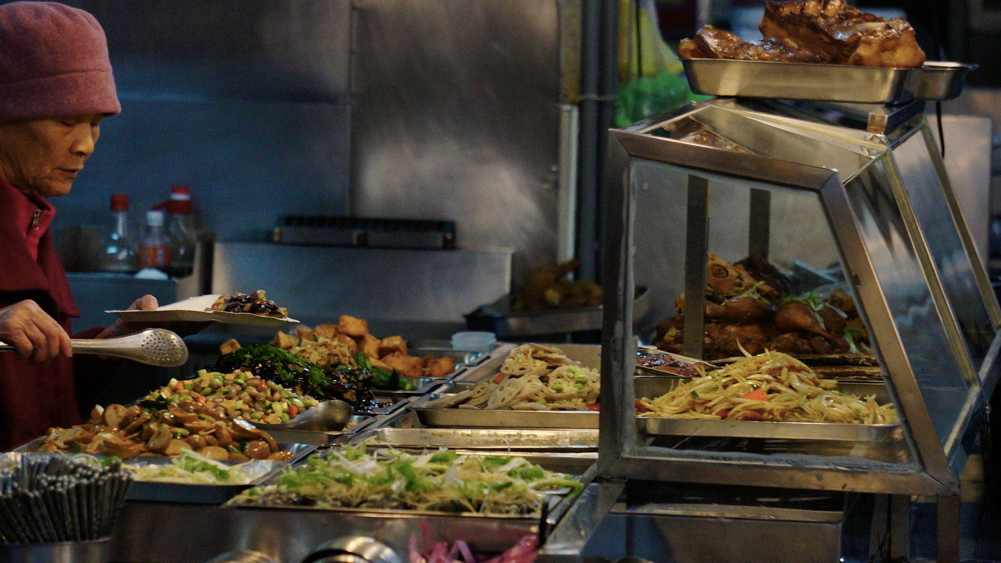 Sony E 55-210mm F4.5-6.3 OSS sample photo. Buffet in traditional food market photography