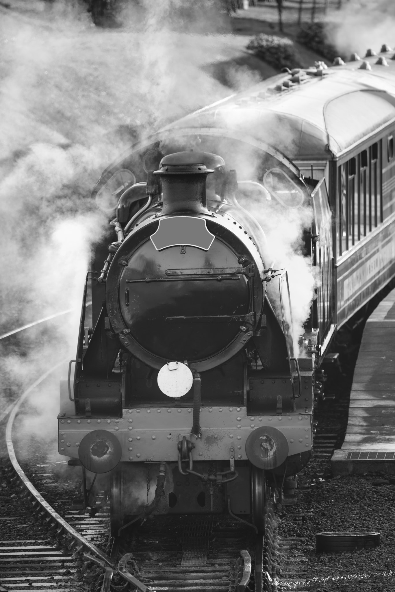 Sigma 150-600mm F5-6.3 DG OS HSM | C sample photo. Restored victorian era steam train engine with full steam in bla photography