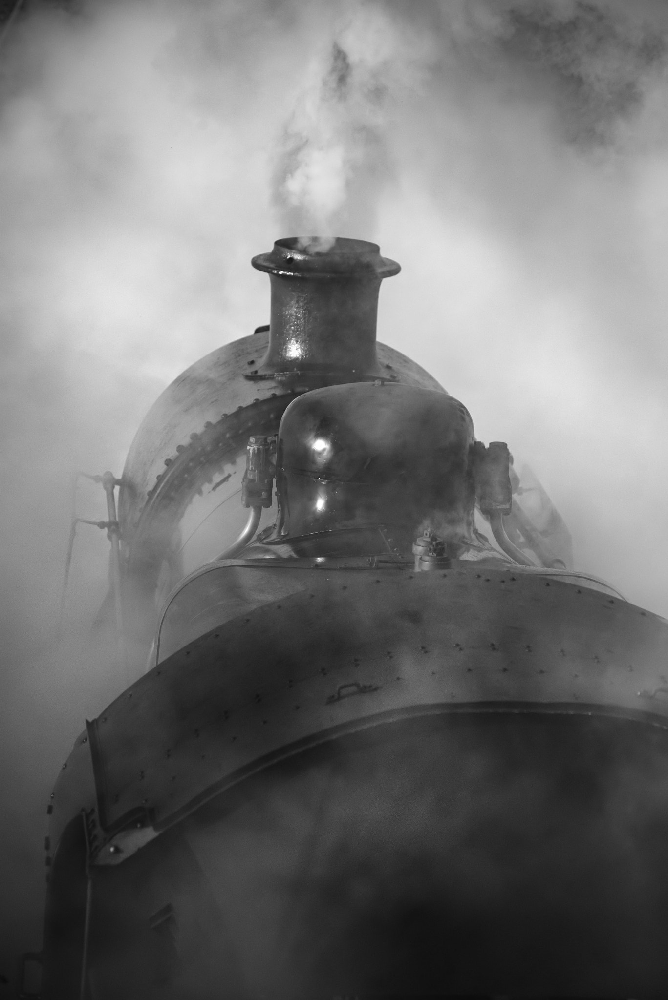 Sigma 150-600mm F5-6.3 DG OS HSM | C sample photo. Restored victorian era steam train engine with full steam in bla photography